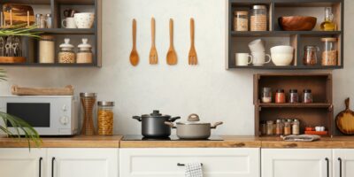 A well-organized kitchen with tidy shelves, clutter-free counterspace, and other storage solutions.